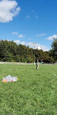 Students playing baseball at Agora Prep Academy